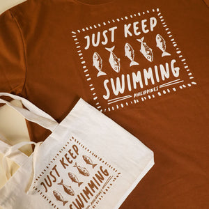 Men's Just keep Swimming Graphic tee with Pouch in Rust