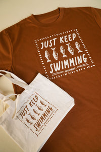 Men's Just keep Swimming Graphic tee with Pouch in Rust